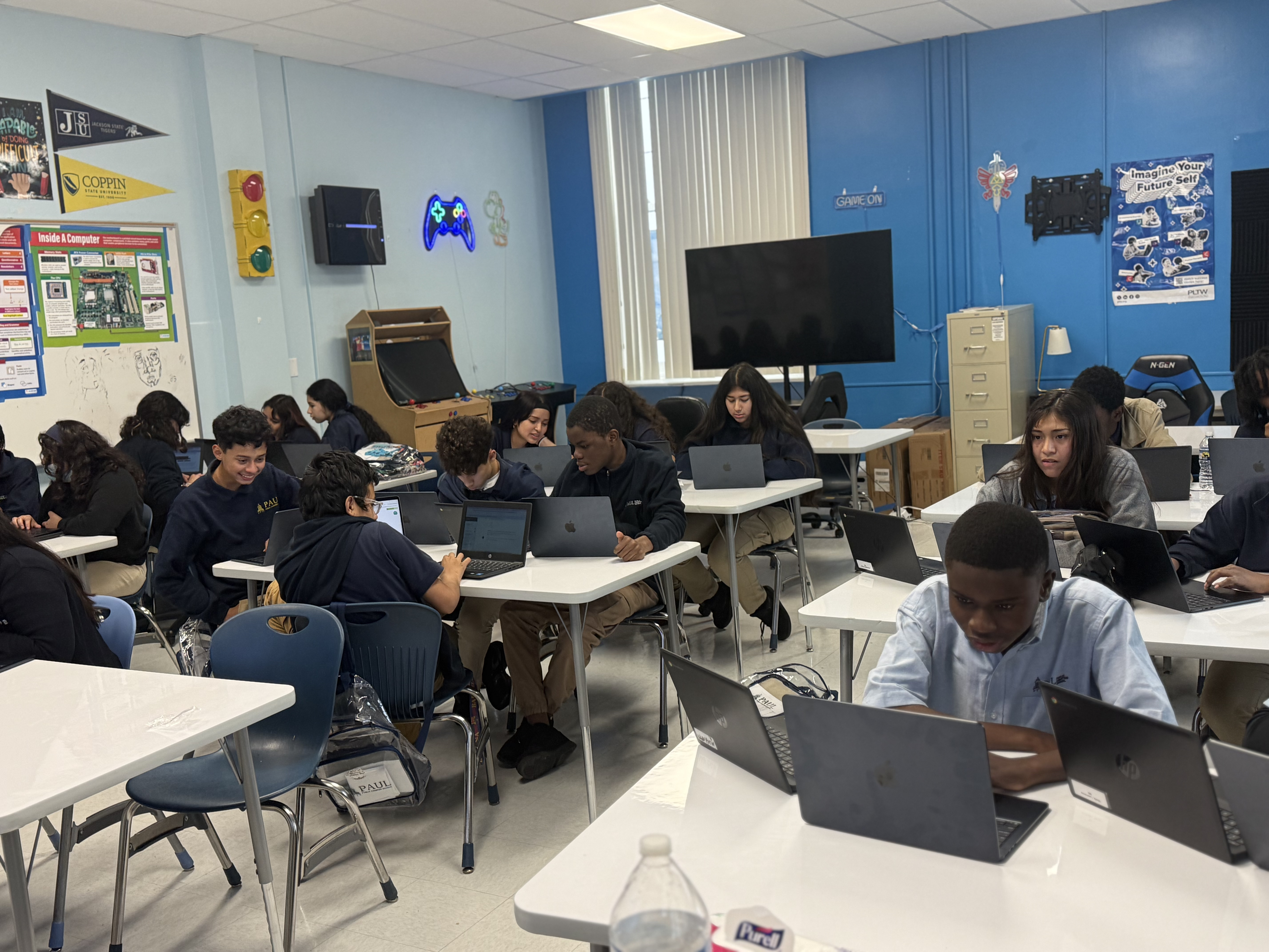 Paul International students coding in class