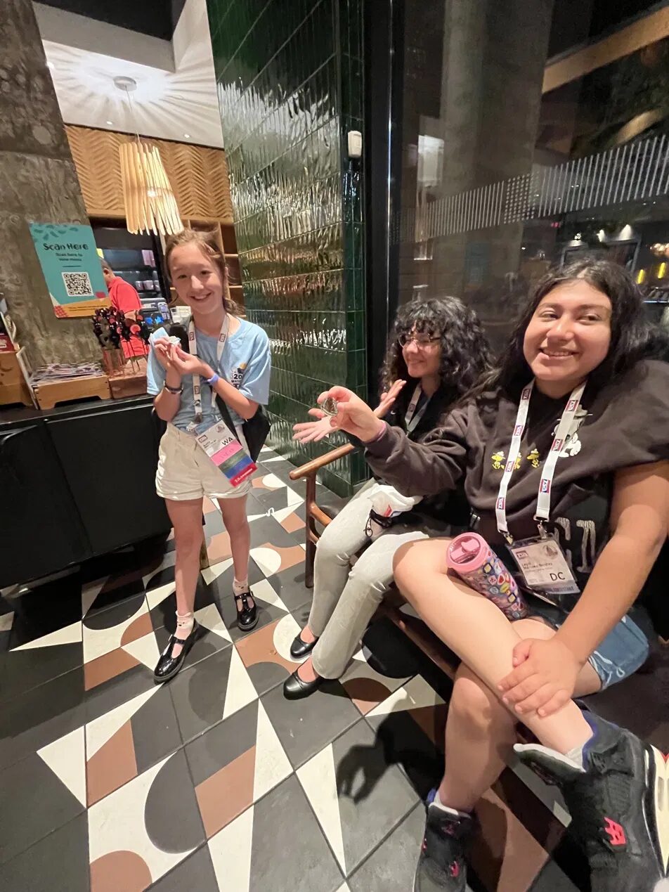 Paul International students trade their Washington, D.C. state pins for the first time at the 2026 TSA National Conference.